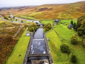 Autumn colors over Claerwen Dam, Claerwen Valley, Elan Valley Reservoir, Rhayader, Powys, Wales, UK