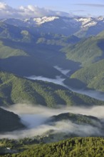 Mist in the valleys at sunrise, seen from the Col de Portel, Pyrenees, France