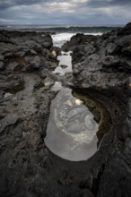 Tide pools, rocky coast with volcanic stones, Playa de la Pequeña, Punta Usaje, Lanzarote, Canary