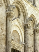 Magnificent stone carvings, figures and reliefs, façade of the Cathedral of San Cerbone, Basilica