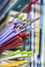 A vibrant collection of Murano and Burano glass rods in a spectrum of colors. This Venetian glass