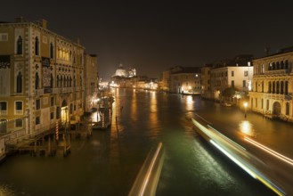 Grand Canal with view of Santa Maria della Salute at night, Venice, Veneto, Italy