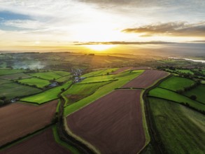 Colours of autumn Fields and Farms over Sheldon from a drone, Torbay, Devon, England, United
