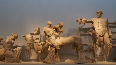 On the right, the god Apollo, west pediment of the Temple of Zeus, battle between lapiths and