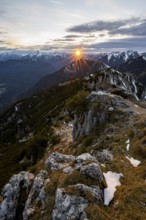 Mountain panorama, mountain landscape with sun star at sunset, at the summit of the Kramerspitz, in