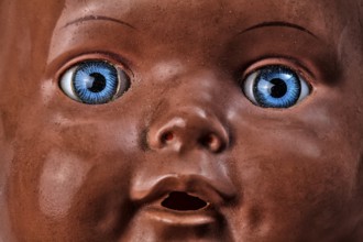 Old doll, demonic face