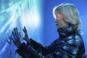 Elderly Asian woman immerses in the metaverse, exploring holographic digital interfaces. Wearing a