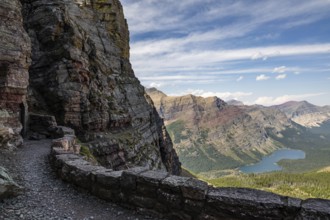 Rugged mountain landscape of Glacier National Park in Montana, showcasing dramatic cliffs, lush