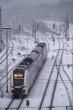 Winter weather, heavy snowfall, railway tracks in front of Essen main station, RE1, RRX, Rhine-Ruhr