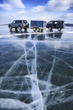 Cars on ice, Lake Baikal, Olkhon Island, Pribaikalsky National Park, Irkutsk Province, Siberia,