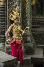 Young woman dressed as a temple dancer, Apsara, Ta Prohm, Angkor Wat, Angkor, UNESCO World Heritage