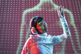 A futuristic Latin woman enjoys music through headphones. Immersed in the sound, her expression