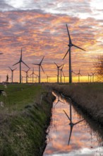 Wind farm near the East Frisian town of Norden, east of the town, sunset, Lower Saxony, Germany