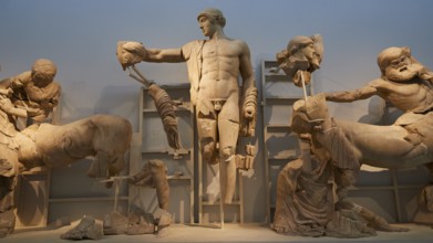 God Apollo in the middle, west pediment of the Temple of Zeus, battle between lapiths and centaurs,