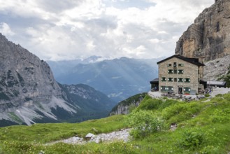 Rifugio Maria E Alberto Ai Brentai mountain hut and rocky peak, Brenta, Trentino, Italy
