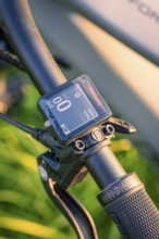 Close-up of a bicycle handlebar with display, background with nature, forest bike, e-bike, Calw,