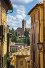 Old town with view of Basilica di San Clemente, historical, building, alley, Siena, Tuscany, Italy