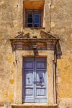 Entrance portal of the Madonna di Monserrato church, near Porto Azzurro, Elba Island, Tuscan
