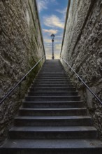 Lantern at the end of a staircase on Ile de la Cité in Paris, France