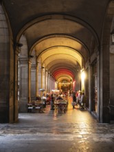 Restaurants in the arcades at Plaça Reial in Barcelona, Spain