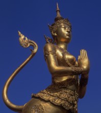 Wat Phra Kaeo, Temple of the Emerald Buddha, gilded statues of mythological creatures of the