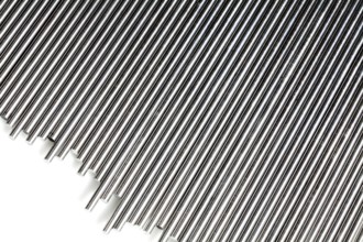 A stack of round bundled aluminium rods, Ein Bündel mit Stäben aus Aluminium