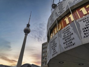 The Berlin TV Tower and the Berlin World Clock under blue sky and sunset, Alexanderplatz, Alex,
