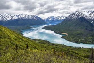 View of snowy mountains and turquoise lake Kenai Lake, Slaughter Ridge Trail, Cooper Landing, Kenai