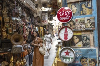Cairo, Egypt. April 21st 2025. Foreign tourists shopping for gifts and souvenirs in the popular