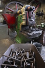 Machine in a drop forge, engine valves in front, formerly Dietz & Pfriem valve factory, today