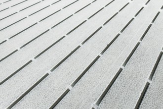 Close-up view of geometric salt formations at Salinas Grandes in Salta, Argentina. The surface