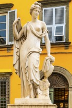 Fontana della Pupporona statue in Piazza San Salvatore, historic city centre, Lucca, Tuscany, Italy