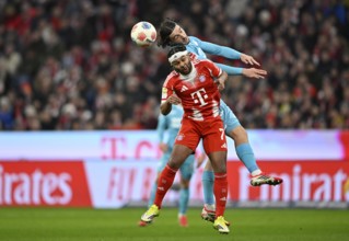 Header duel tackle action Serge Gnabry FC Bayern Munich FCB (07) against Leon Avdullahu TSG 1899