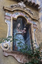 Figure of a saint with child in an alley, Christianity, Mary, Jesus, depiction, Italy