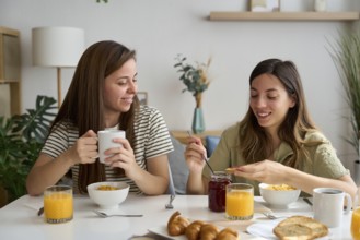 A loving lesbian couple shares a cozy breakfast at home, surrounded by morning light and comfort