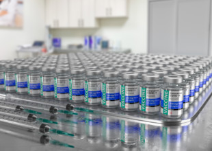 Hundreds of Coronavirus COVID-19 Vaccine Vials and Syringes In Medical Office