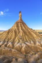 Majestic castildetierra rock formation rises against a vibrant blue sky in the bardenas reales