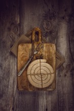 Raw spiral sausages, on a wooden board, top view, no people