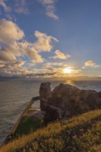 Red red sandstone cliff edge, Heligoland high sea island, Lange Anna, backlight, North Sea, blue