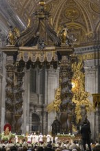 Saint Father Pope Francis with mitre prays in St Peter's Basilica under canopy of Bernini holds