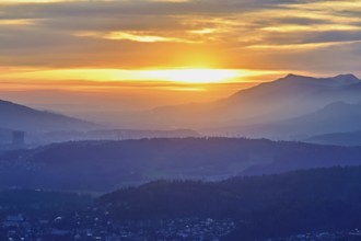 View of the Jura foothills from the Gisliflue, in the light of the setting sun, Talheim, Canton,