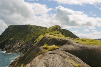 Panoramic view of the rugged cliffs and ocean at Signal Hill, Middle Cove, Newfoundland & Labrador,