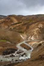 Steaming streams between colourful rhyolite mountains, Hveradalir geothermal area, Kerlingarfjöll,