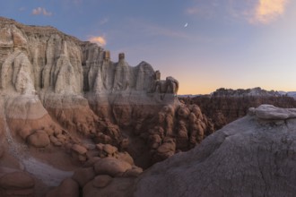 Scenic view of unique sandstone formations at Goblin Valley State Park in Utah during sunset,