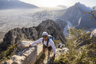A man skillfully practices mountaineering and rappelling at Eagleâ€™s Nest in Monterrey, Mexico,