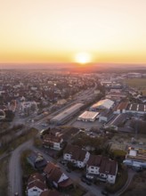 Industrial and residential areas of a small town at sunset, quiet atmosphere, Althengstett,