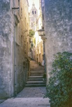 Stone steps of narrow alleyway street in the old town, Korcula, Croatia, former Yugoslavia, Europe