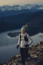 Trail running in autumn on the Jochberg on Lake Walchensee against the wonderful backdrop of the