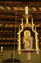 Carved figure of the Virgin Mary with baby Jesus, interior detail in the Church of the Holy Spirit