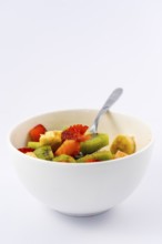 Recipe of a fruit salad with kiwis, strawberries, bananas finished